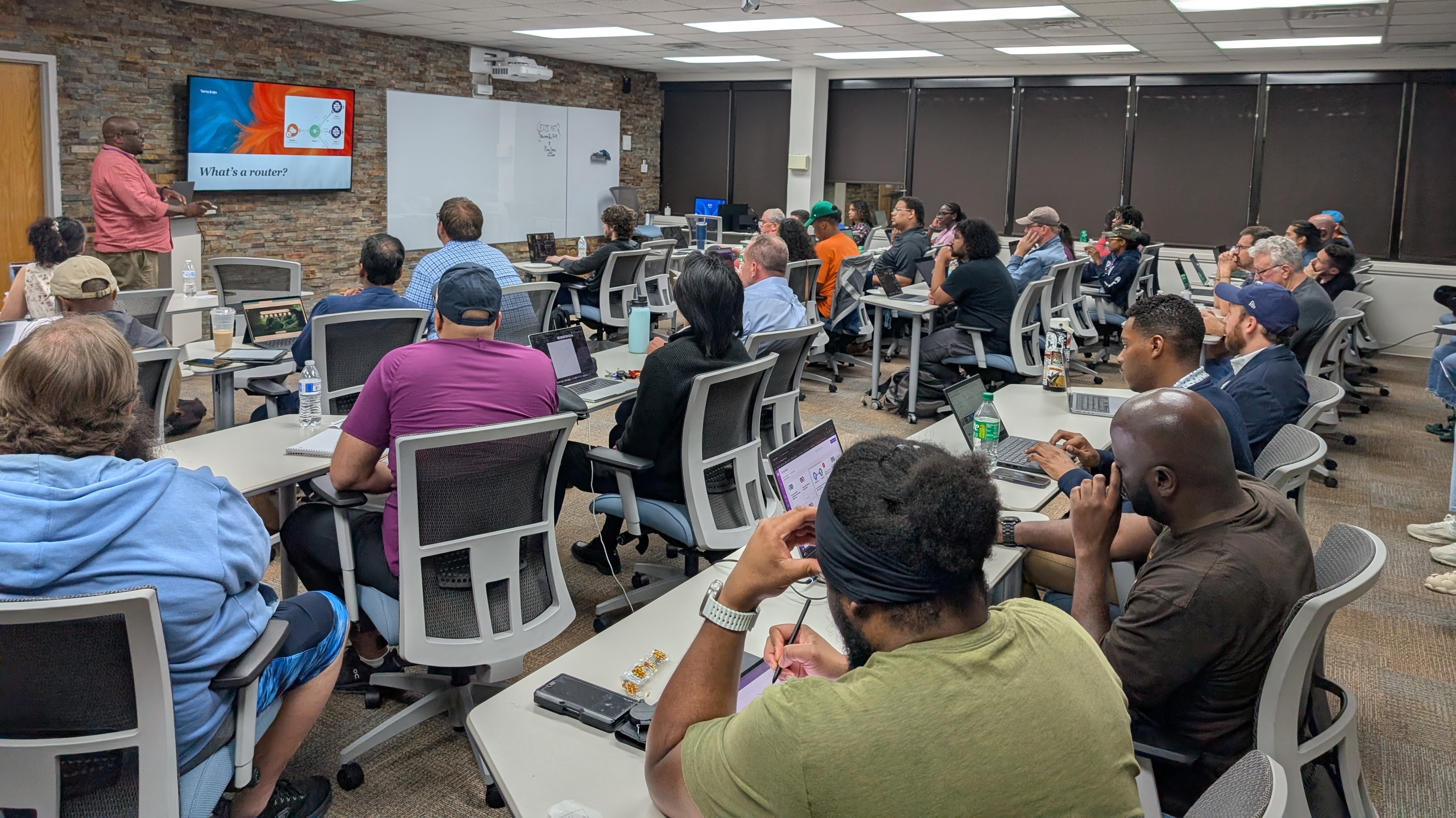 AI workshop in session — attendees working at laptops